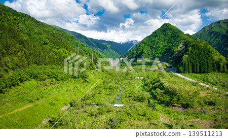 In May, snowmelt water flows through a small stream in eastern Toyama Prefecture. In May, snowmelt water flows through a small stream in eastern Toyama Prefecture. 139511213