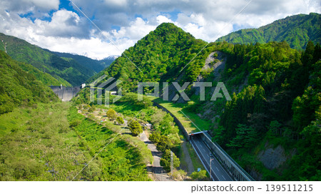 In May, snowmelt water flows through a small stream in eastern Toyama Prefecture. 139511215