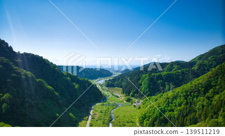 In May, snowmelt water flows through a small stream in eastern Toyama Prefecture. In May, snowmelt water flows through a small stream in eastern Toyama Prefecture. 139511219
