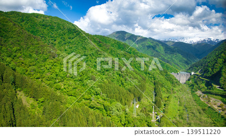 In May, snowmelt water flows through a small stream in eastern Toyama Prefecture. In May, snowmelt water flows through a small stream in eastern Toyama Prefecture. 139511220