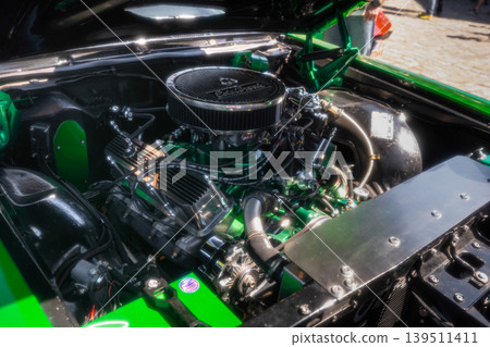 Berlin, Germany - May 2, 2026. Custom engine bay at car show Berlin, Germany - May 2, 2026. Custom engine bay at car show 139511411