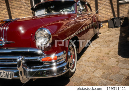 Berlin, Germany - May 2, 2026. Red Pontiac classic car detail Berlin, Germany - May 2, 2026. Red Pontiac classic car detail 139511421