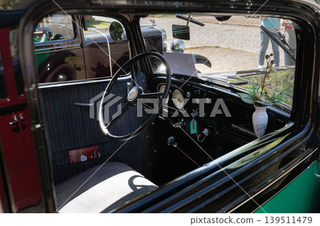 Berlin, Germany - May 2, 2026. Interior of vintage Austin car Berlin, Germany - May 2, 2026. Interior of vintage Austin car 139511479