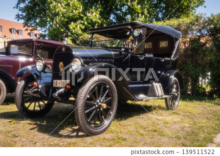 Berlin, Germany - May 2, 2026. Vintage black touring car Berlin, Germany - May 2, 2026. Vintage black touring car 139511522