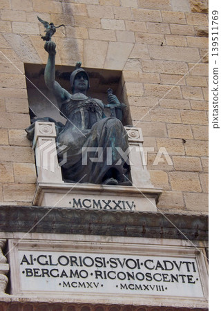 Monumental statue to the fallen in Bergamo, Italy. 139511769