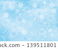 Soap bubbles floating against a pale blue background; a sparkling, bubbly summer backdrop. 139511801