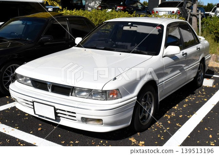 Car parked in parking lot Car parked in parking lot 139513196