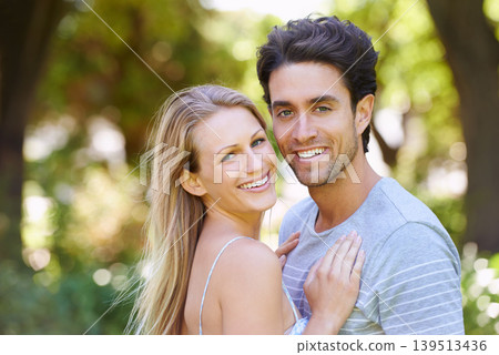 Portrait, hug or happy couple in park for date, support or care on a summer in nature together. Relax, romantic man or woman with smile on outdoor holiday vacation for bond, travel or freedom in USA Portrait, hug or happy couple in park for date, support or care on a summer in nature together. Relax, romantic man or woman with smile on outdoor holiday vacation for bond, travel or freedom in USA 139513436