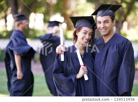 Happy couple, portrait and hug with certificate for graduation, qualification or education in nature. Man and woman student or graduate smile in higher certificate, diploma or degree together outdoor Happy couple, portrait and hug with certificate for graduation, qualification or education in nature. Man and woman student or graduate smile in higher certificate, diploma or degree together outdoor 139513456