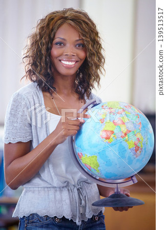 Happy black woman, portrait and teacher with globe for geography, history or planet in classroom or auditorium. African female person or educator smile holding 3D model of round world, earth or map 139513517