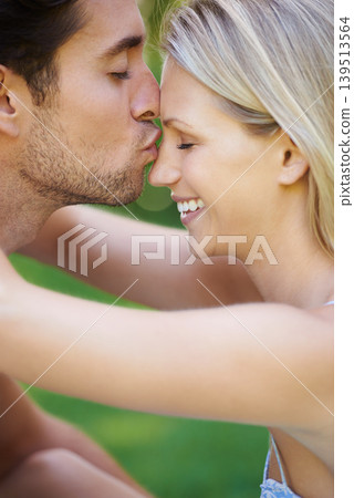 Happy couple, man kiss woman with love, commitment and care outdoor, Valentines day and healthy relationship. Loyalty, respect and trust with partner, people are bonding with affection and connection Happy couple, man kiss woman with love, commitment and care outdoor, Valentines day and healthy relationship. Loyalty, respect and trust with partner, people are bonding with affection and connection 139513564