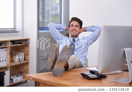 Smile, relax or happy man in office thinking of break for mental health, pride or wellness at desk. Calm, business or confident male employee with peace or hand behind his head stretching or resting Smile, relax or happy man in office thinking of break for mental health, pride or wellness at desk. Calm, business or confident male employee with peace or hand behind his head stretching or resting 139513618