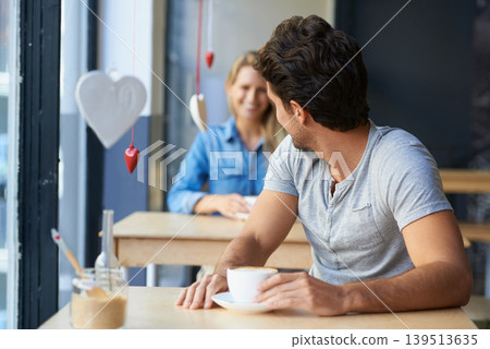 Back, flirting or happy man in cafe with a coffee to relax with smile, morning espresso or crush. Face, romance or person looking with tea, cappuccino or woman with love, peace or calm in restaurant Back, flirting or happy man in cafe with a coffee to relax with smile, morning espresso or crush. Face, romance or person looking with tea, cappuccino or woman with love, peace or calm in restaurant 139513635