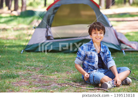 Tent, camping or portrait of happy child in nature for playing, adventure or holiday vacation in park. Relax, confidence or male child with smile in woods, garden or forest for fun hiking or wellness 139513818