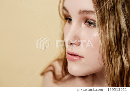 Woman, face and beauty, natural makeup and skincare with wellness, dermatology and glow on beige background. Healthy skin, cosmetics and mockup space, young model thinking about treatment in studio Woman, face and beauty, natural makeup and skincare with wellness, dermatology and glow on beige background. Healthy skin, cosmetics and mockup space, young model thinking about treatment in studio 139513951