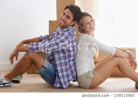 Apartment, portrait and couple moving boxes in new home, property and sitting on floor. Building, man and woman for purchase, real estate and mortgage for relocation, new house and homeowner Apartment, portrait and couple moving boxes in new home, property and sitting on floor. Building, man and woman for purchase, real estate and mortgage for relocation, new house and homeowner 139513985