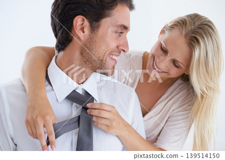 Help, happy woman or tie of businessman with smile, care or love in home ready for work or job. Prepare, fashion or couple in marriage with support, commitment or bond on white background in morning 139514150