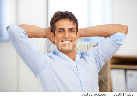 Portrait, relax or happy man in workplace on break for mental health, pride or wellness at desk. Calm, freedom or male employee with smile or hand behind his head in a business stretching or resting Portrait, relax or happy man in workplace on break for mental health, pride or wellness at desk. Calm, freedom or male employee with smile or hand behind his head in a business stretching or resting 139514195