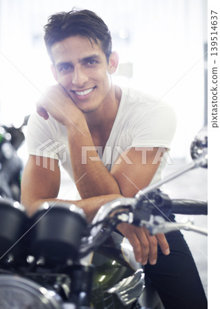 Happy man, portrait and motorcycle in garage for cool transportation or small vehicle at home. Face of young handsome male person or biker smile and leaning on cool automobile or mechanical motorbike Happy man, portrait and motorcycle in garage for cool transportation or small vehicle at home. Face of young handsome male person or biker smile and leaning on cool automobile or mechanical motorbike 139514637