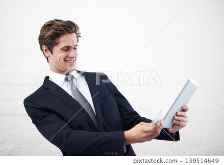 Happy businessman, tablet and phone for communication, research or social media on a white studio background. Man or employee in business fashion with mobile smartphone and technology on mockup space Happy businessman, tablet and phone for communication, research or social media on a white studio background. Man or employee in business fashion with mobile smartphone and technology on mockup space 139514649