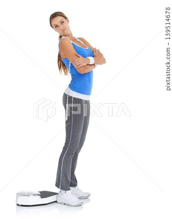 Young woman, portrait and scale for fitness, weight loss or diet on a white studio background. Female person with arms crossed standing in confidence for workout, exercise or training on mockup space 139514678