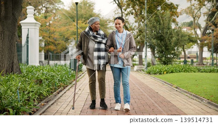 Help, cane and nurse with old woman in park for relax, support and person with a disability. Elderly care, conversation and healthcare with caregiver and patient in nature for medical rehabilitation Help, cane and nurse with old woman in park for relax, support and person with a disability. Elderly care, conversation and healthcare with caregiver and patient in nature for medical rehabilitation 139514731