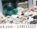 Floating glass balls and seashells 139515317