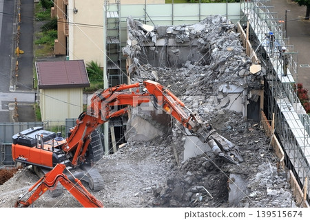 Image of demolition work on an apartment building. Image of demolition work on an apartment building. 139515674