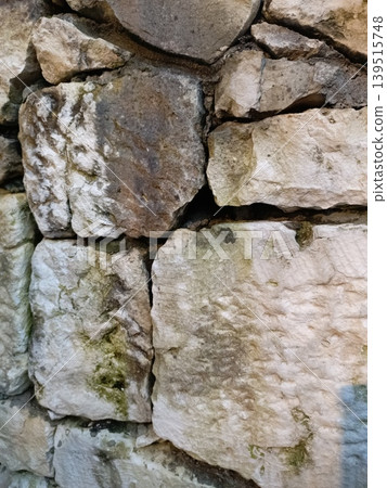 Texture of an old stone path moss plant high-quality photo 139515748