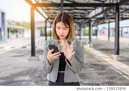asian businesswoman use smartphone for working or shopping online outdoor asian businesswoman use smartphone for working or shopping online outdoor 139515936