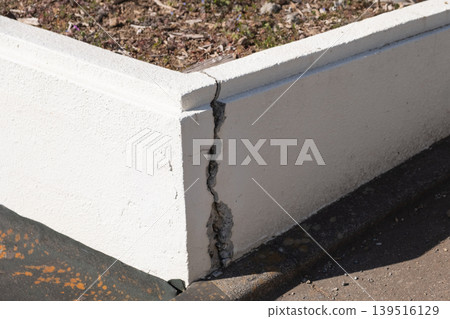 Image of cracks in a built-in flower bed Image of cracks in a built-in flower bed 139516129