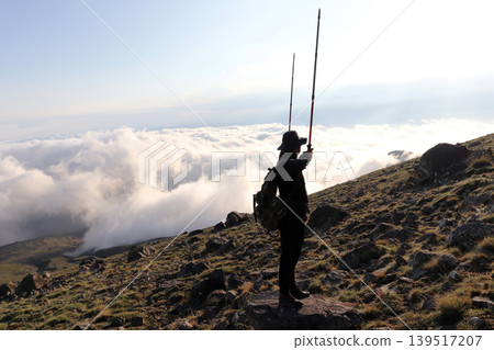The clouds are gathering towards the summit. The clouds are gathering towards the summit. 139517207