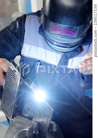 Male Welder Working At Welding Factory. Male Welder Working At Welding Factory. 139517339