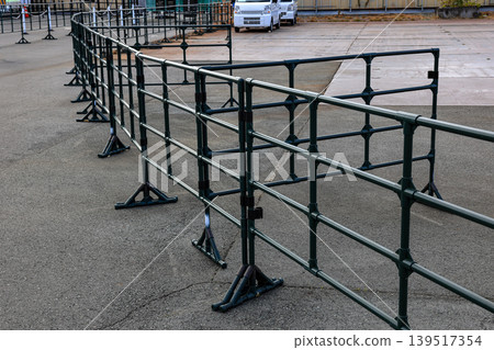 Steel railing along the park walkway. Steel railing along the park walkway. 139517354