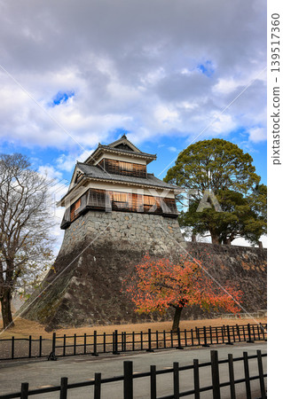 The fortress or rampart standing high in ancient castle of japan, with blue sky. The fortress or rampart standing high in ancient castle of japan, with blue sky. 139517360