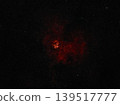 Glowing red nebula, composed of vast clouds of gas and dust, shines against a dense background of countless distant stars. Telescope live. 139517777