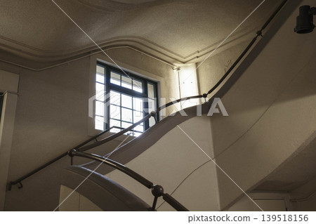 A staircase in a retro building, photographed at the Kobe City Overseas Emigration and Cultural Exchange Center. 139518156