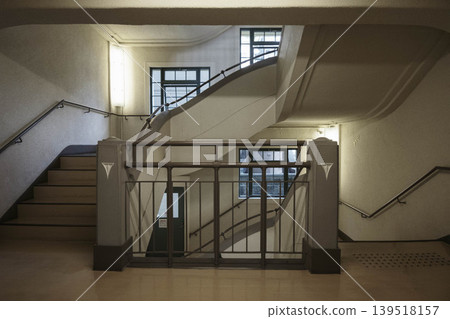 A staircase in a retro building, photographed at the Kobe City Overseas Emigration and Cultural Exchange Center. 139518157
