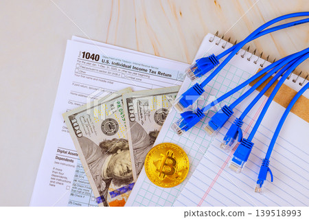 Tax preparation process with documents, cash, digital assets during tax preparations financial planning 139518993
