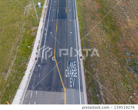Aerial view of an EV charging road lane in Salt Lake City, Utah, USA. Aerial view of an EV charging road lane in Salt Lake City, Utah, USA. 139519276