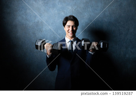 與啞鈴的一個商人 與啞鈴的一個商人 139519287