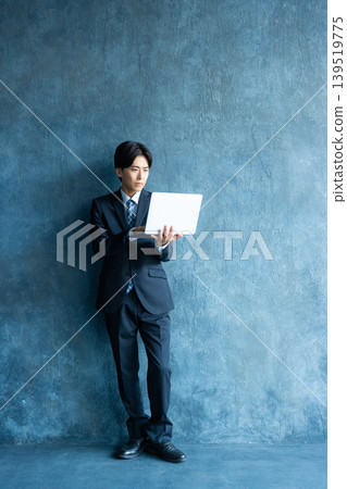 Businessman wearing a suit Businessman wearing a suit 139519775