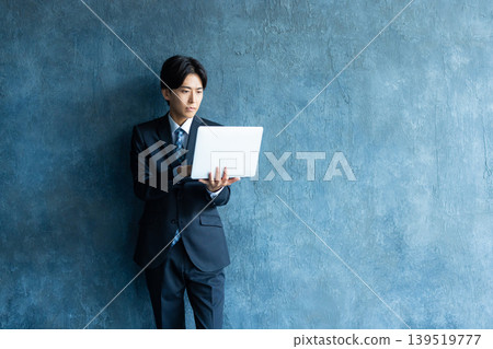 Businessman wearing a suit Businessman wearing a suit 139519777