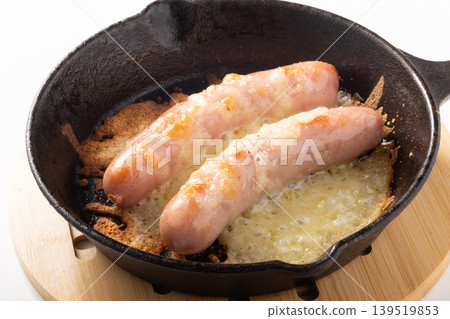 Baked sausages with cheese Baked sausages with cheese 139519853