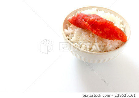 White rice and cod roe served in a bowl with a white background. White rice and cod roe served in a bowl with a white background. 139520161