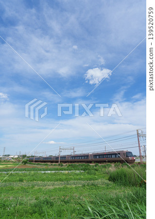 Odakyu Romancecar speeding through the countryside in early summer - Isehara Odakyu Romancecar speeding through the countryside in early summer - Isehara 139520759