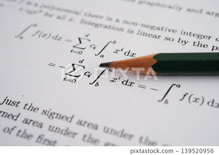Pencil on mathematic formula exercise test paper in education school. Pencil on mathematic formula exercise test paper in education school. 139520956