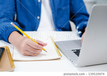 Teenage using tablet for communication, search data internet website to learn. 139520974