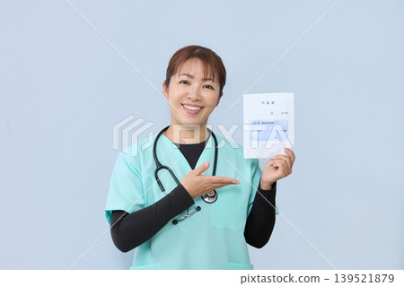 A female medical staff member guides you through the process of using your medication record book. A female medical staff member guides you through the process of using your medication record book. 139521879
