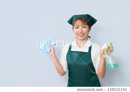 Housekeeping staff carrying cleaning supplies Housekeeping staff carrying cleaning supplies 139522242